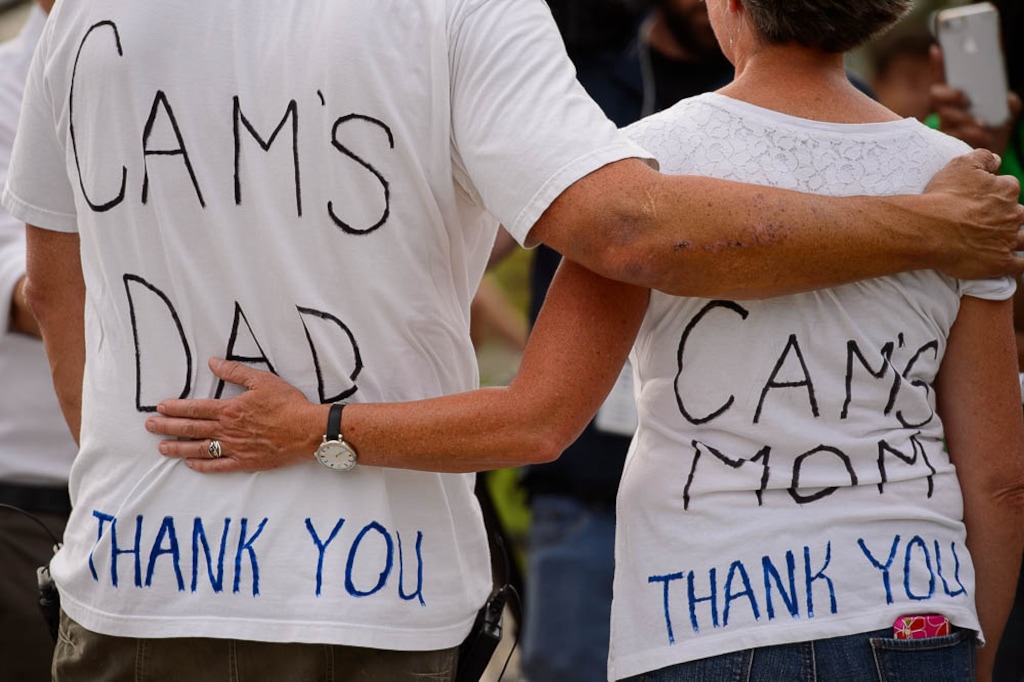 (Trent Nelson | The Salt Lake Tribune) Cyclists gather and ride around Salt Lake City's Liberty Park, Saturday July 21, 2018, in remembrance of Cameron Hooyer, a rider who was killed by a FrontRunner train during a 999 Ride on Thursday. Hooyer's parents Mark and Carla Hooyer.