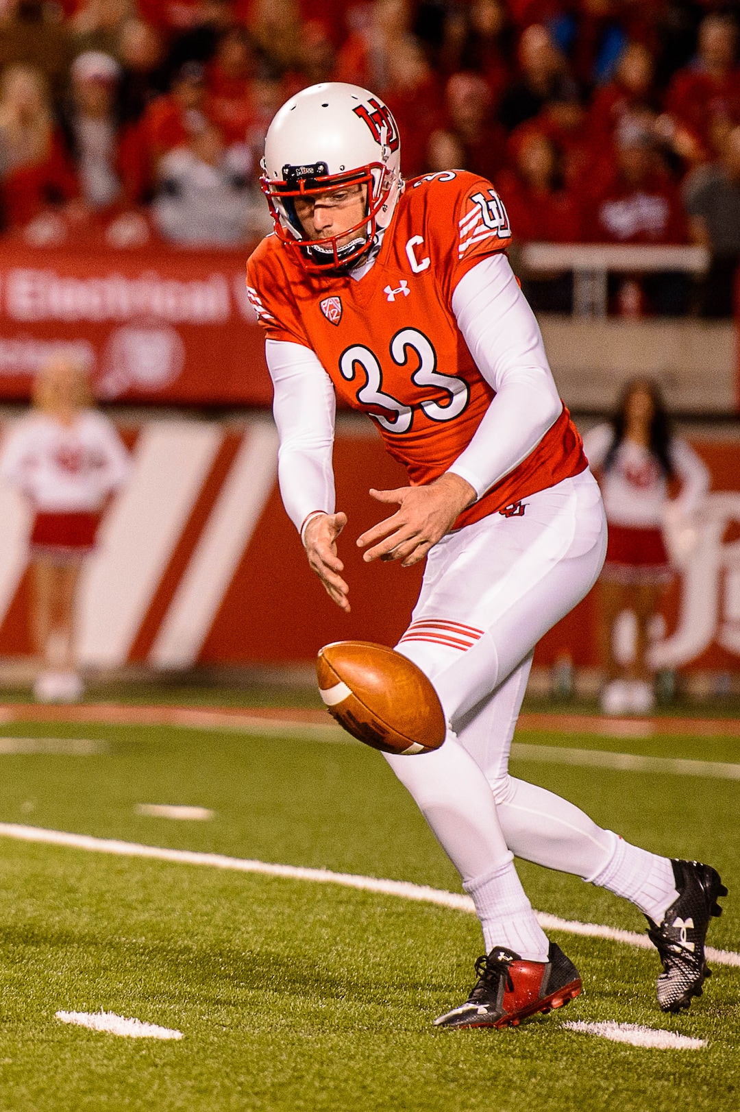 (Trent Nelson | The Salt Lake Tribune)  Utah Utes punter Mitch Wishnowsky (33) loses control of the ball as the University of Utah hosts Stanford, NCAA football at Rice-Eccles Stadium in Salt Lake City Saturday October 7, 2017.
