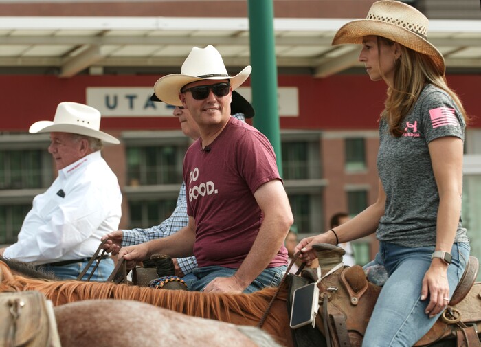 (Leah Hogsten | The Salt Lake Tribune) To kick off the start of Utah's Days of '47 rodeo week, Governor Spencer Cox, First Lady Abby Cox and working ranglers drove a herd of longhorn cattle from the heart of Salt Lake City to the  Utah Fair Park, Tuesday, July 19, 2022.