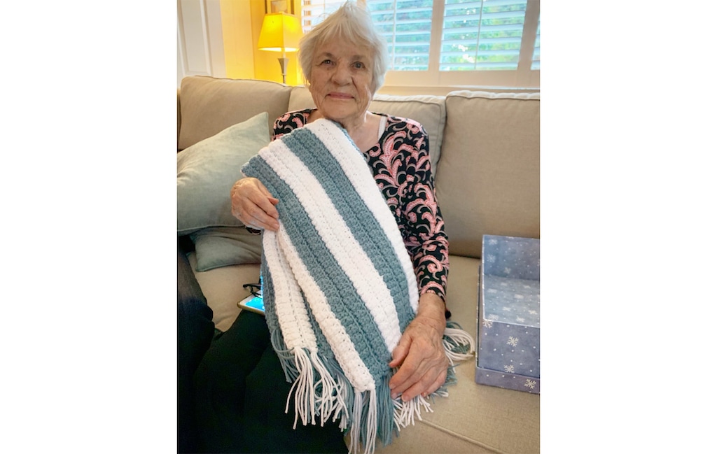 (Eli McCann) Eli McCann's grandmother, with the blanket she had made him as a wedding gift.