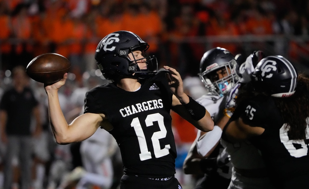 (Francisco Kjolseth | The Salt Lake Tribune) Corner Canyon quarterback Devon Brown (12) goes for the long pass in prep football action between the Corner Canyon Chargers and the Skyridge Falcons, on Friday, Sept. 24, 2021, in Draper.