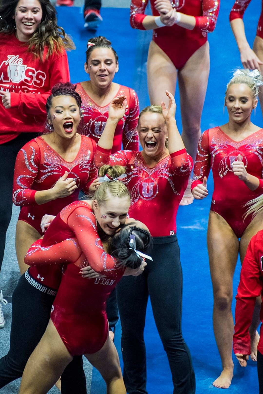 (Chris Detrick  |  The Salt Lake Tribune)  Utah's Kim Tessen celebrates with her teammates after competing on the vault during the gymnastics meet against Brigham Young University Friday, January 5, 2018.  