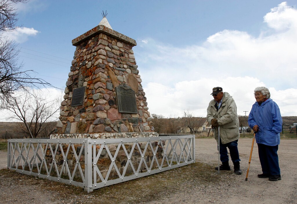 (Rick Egan  |  Tribune file photo)  Helen Timbimboo and Leland Pubigee, at the monument for the Bear River Massacre, near Preston Idaho in 2008.