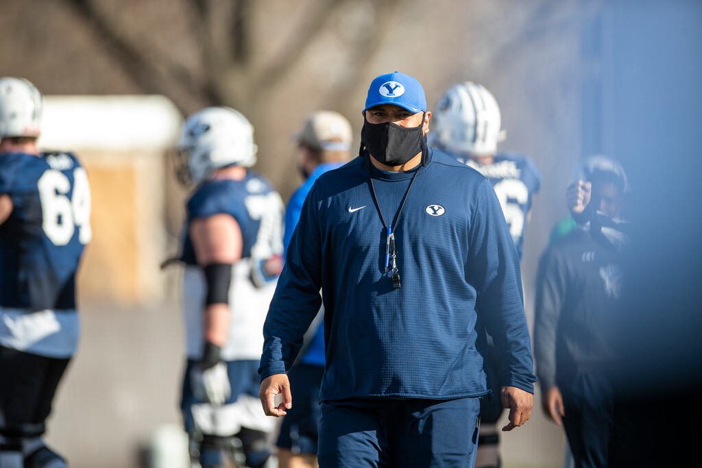 (Tyler Richardson | BYU) Head coach Kalani Sitake participates in BYU spring football practice, Thursday, March 18, 2021.