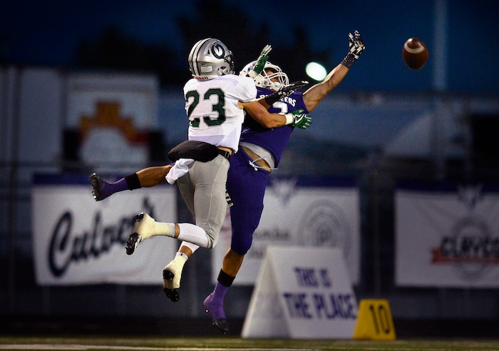 (Scott Sommerdorf   |  The Salt Lake Tribune)   Olympus RB Robbie Ballam can't get to this first half pass. Lehi led Olympus 26-0 late in the second half, Friday, September 22, 2017.