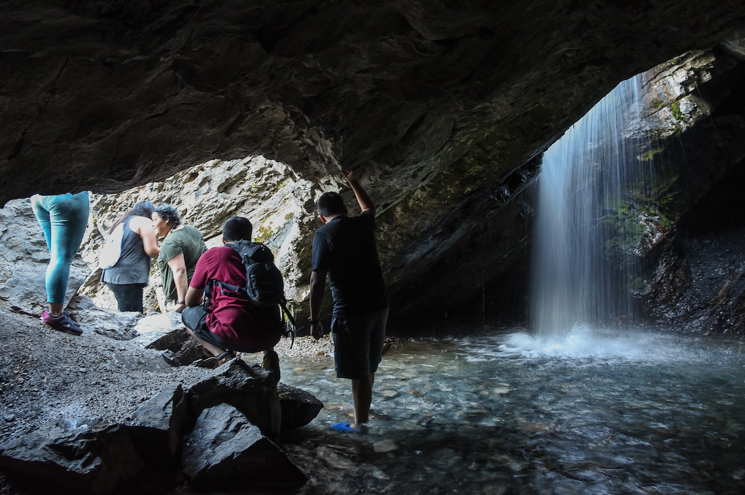 (Francisco Kjolseth  |  The Salt Lake Tribune)  The popular Donut Falls in Big Cottonwood Canyon draws the crowds on Friday, Aug. 31, 2018.