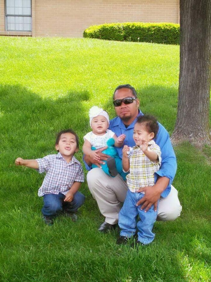 (Photo courtesy Sauelelee Manusina) Aufanua Manusina, pictured here with three of his children, was deported to Samoa on Tuesday.