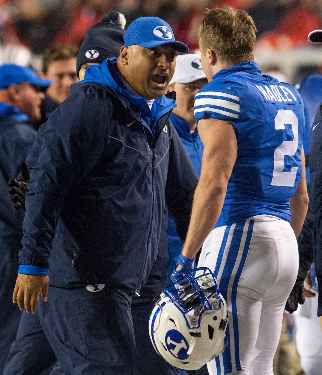 (Rick Egan  |  The Salt Lake Tribune)        Brigham Young Cougars head coach Kalani Sitake  congratulates Brigham Young running back Matt Hadley (2) after he scored a touchdown for the Cougars,  in football action between the Brigham Young Cougars and the Utah Utes, at Rice-Eccles Stadium, Saturday, November 24, 2018.