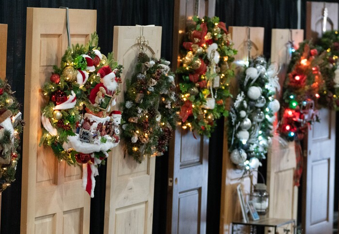 (Francisco Kjolseth | The Salt Lake Tribune) Wreaths, trees and other holiday decorations are displayed during the 51st annual Festival of Trees at the Mountain America Expo Center in Sandy on Tuesday, Nov. 30, 2021. The hundreds of elaborately decorated holiday trees and decorations that will be up for silent auction, with proceeds going to Intermountain Primary Children’s Hospital, will be virtual for the second year in a row due to the COVID-19 pandemic.
