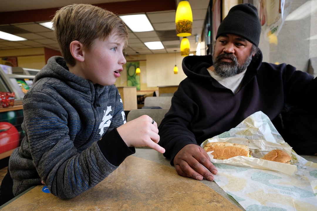 (Francisco Kjolseth  |  The Salt Lake Tribune) Ten-year-old Chase Hansen interviews Viliami Taufalele, who has been homeless since 1999, as he and his father John spend time with people experiencing homelessness in an effort to connect with people on a personal level. Chase who started the organization called Project Empathy has interviewed over 130 people asking them about wide ranging topics in an effort to trigger good memories and make everyone feel "awesome."