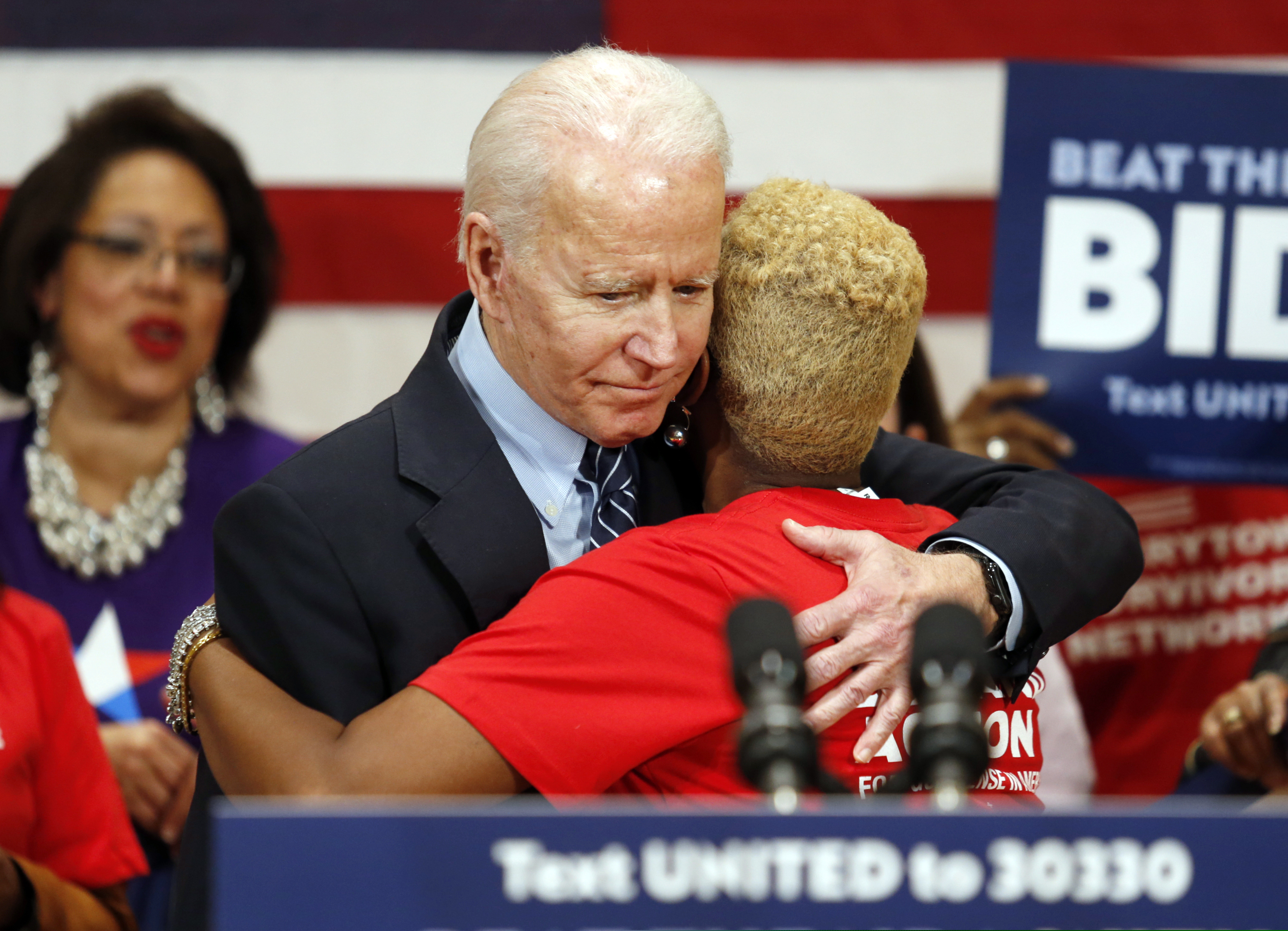 (Paul Vernon | AP) Democratic presidential candidate former Vice President Joe Biden hugs Crystal Turner of Columbus, Ohio, with Moms Demand Action during a campaign rally in Columbus, Ohio, Tuesday, March 10, 2020.