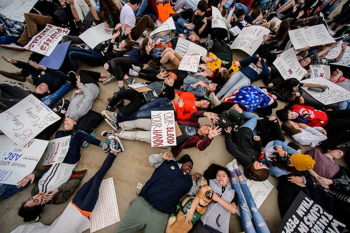 (Trent Nelson | The Salt Lake Tribune)  
High school students staged a die-in at the Utah State Capitol in Salt Lake City to mark the anniversary of the Columbine High School massacre and call for action against gun violence, Friday April 20, 2018.