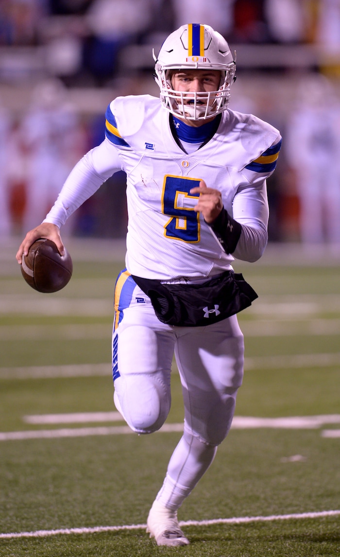 (Leah Hogsten  |  The Salt Lake Tribune)  Orem's quarterback Cooper Legas runs for a touchdown against Sky View High School in their class 4A state semifinal game at Rice-Eccles Stadium, Friday, Nov. 10, 2017.