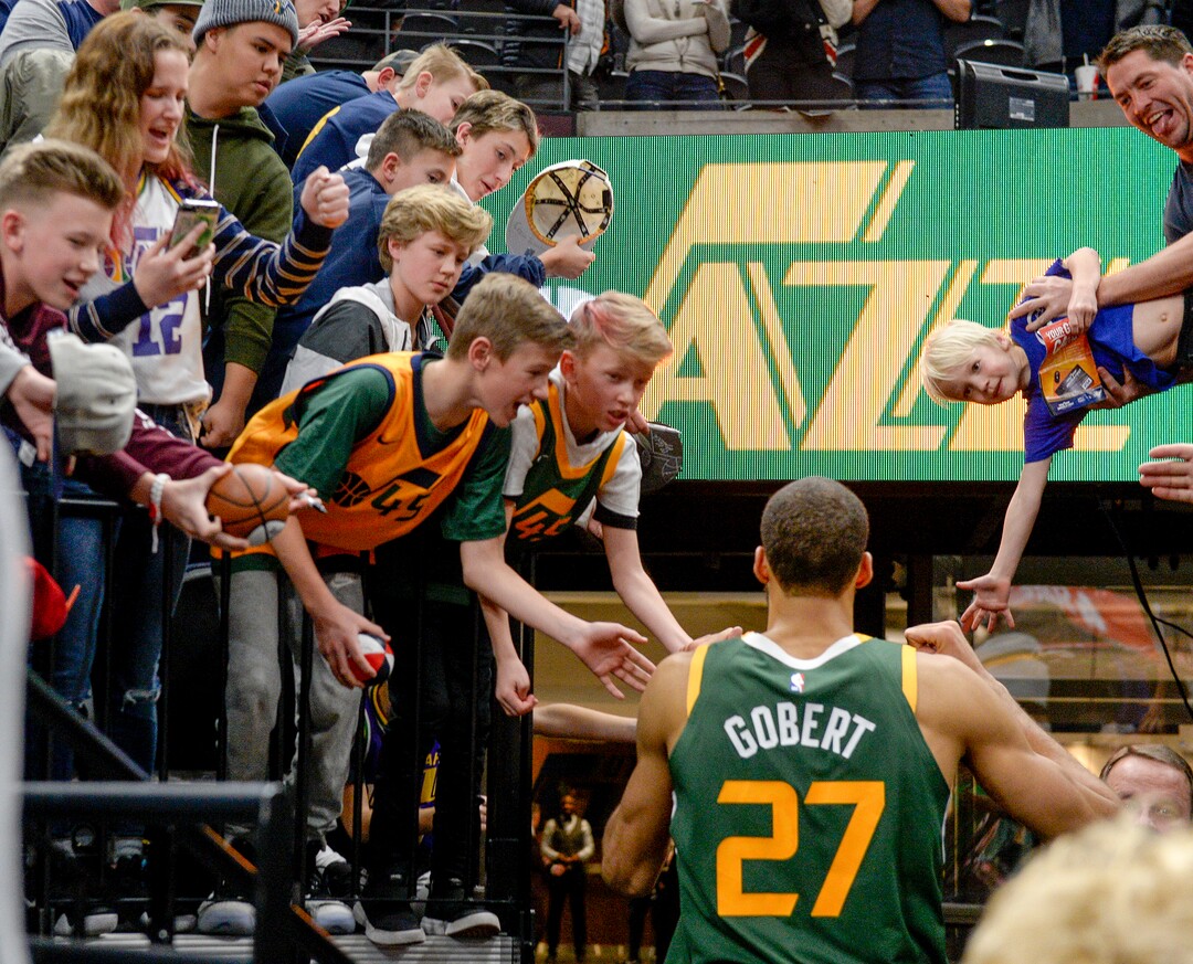 Leah Hogsten  |  The Salt Lake Tribune  Utah Jazz center Rudy Gobert (27) celebrates the win with fans. The Utah Jazz defeated the Portland Trail Blazers, 117-96, Christmas night at Vivint Smart Home Arena.