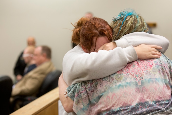 Hannah Baldt, a friend of Jchandra Brown, hugs Brown's mother, Sue Bryan, during the sentencing for Tyerell Przybycien in the 4th District Court on Friday, Dec. 7, 2018, in Provo.