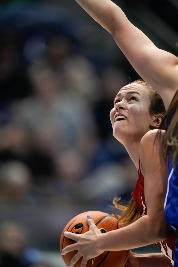 (Francisco Kjolseth | The Salt Lake Tribune) Utah Utes forward Jenna Johnson (22) eyes the basket in basketball action between the Utah Utes and the Brigham Young Cougars, at the Marriott Center in Provo, on Saturday, Dec. 10, 2022.