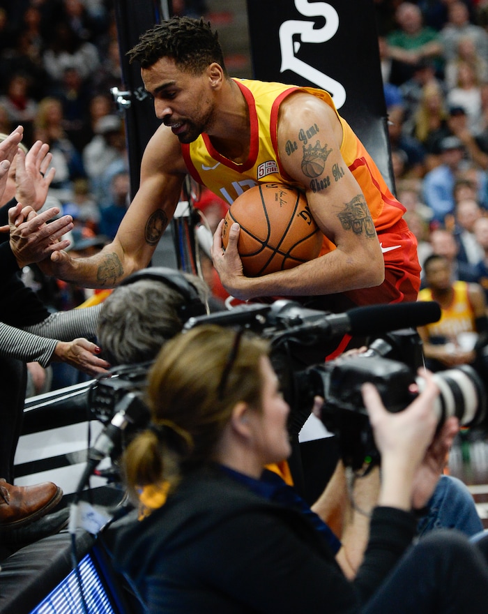 (Francisco Kjolseth  |  The Salt Lake Tribune)   Utah Jazz forward Thabo Sefolosha (22) flies into the stands in pursuit of a ball agains the Thunder in the second half of the NBA game at Vivint Smart Home Arena Sat., Dec. 22, 2018, in Salt Lake City.