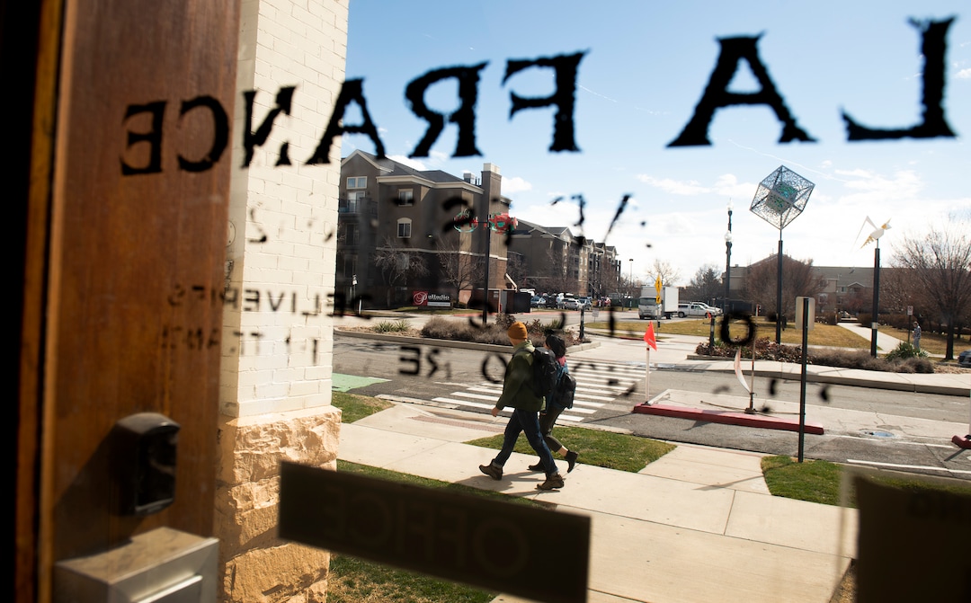 (Leah Hogsten  |  The Salt Lake Tribune) Worshippers in the Greek Orthodox Church of Greater Salt Lake on Sunday endorsed talks with Salt Lake City-based Woodbury Corp. on a partnership to develop choice downtown properties around Holy Trinity Cathedral, at 279 South 300 West. Once at the heart of the city’s Greek Town, the parcels around the historic cathedral total about five acres of  land, including several parking lots and the site of the distinct white La France Apartments, a set of about 60 aging row houses east of the church.