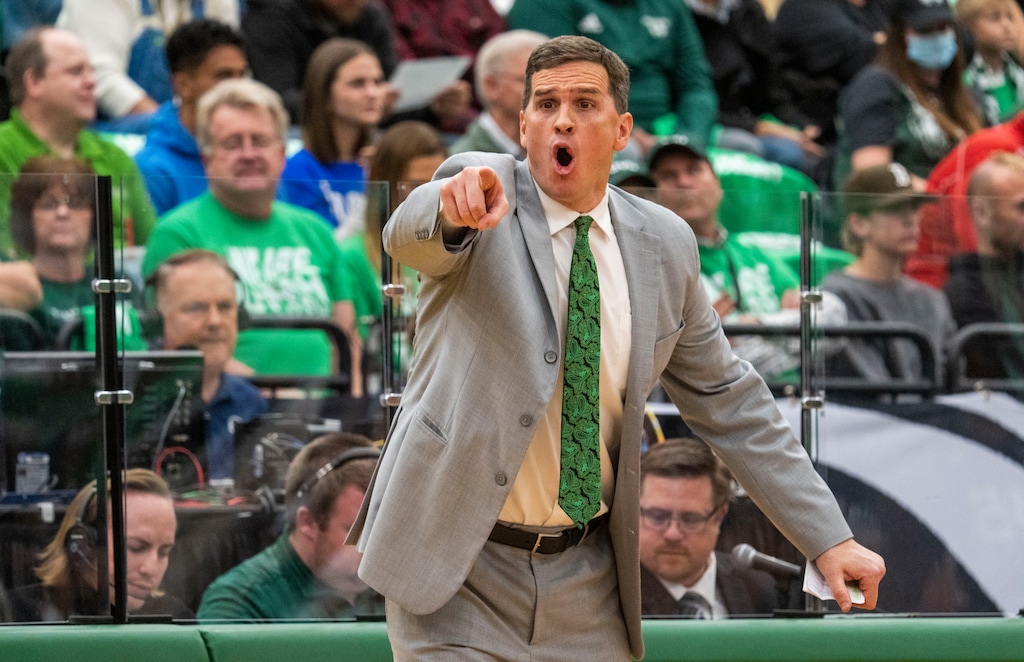 (Rick Egan | The Salt Lake Tribune) Utah Valley Wolverines head coach Mark Madsen shouts directions to his team, in basketball action, between the Brigham Young Cougars and the Utah Valley Wolverines in Orem, on Wednesday, Dec. 1, 2021.