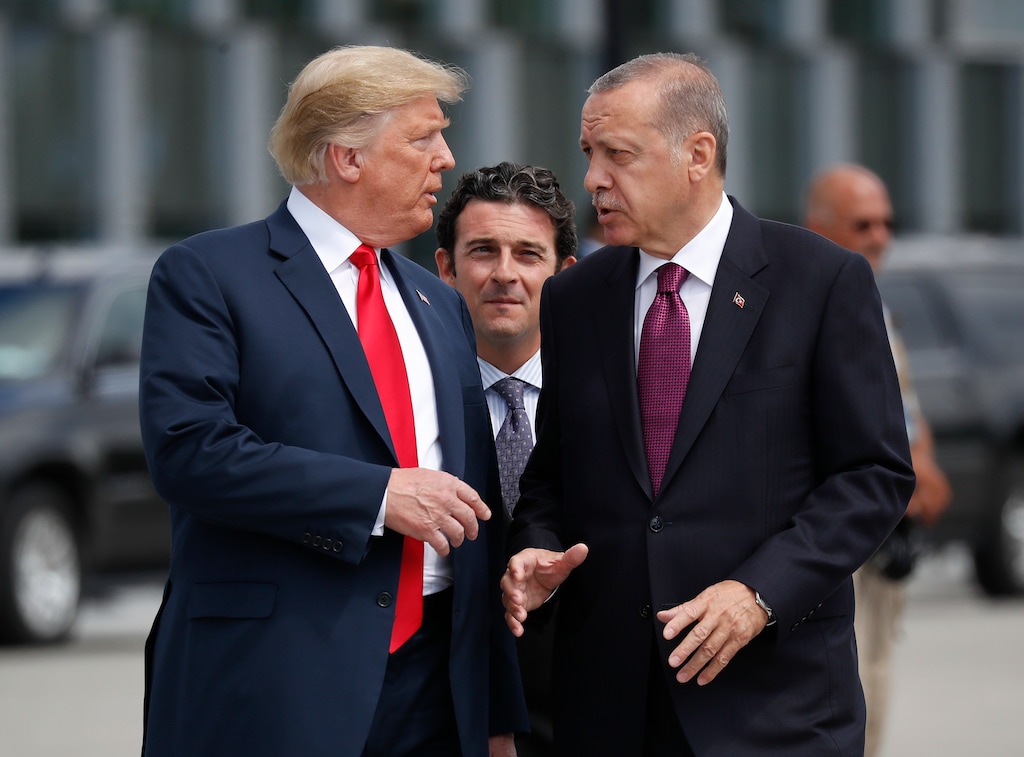 (Pablo Martinez Monsivais | AP file photo) President Donald Trump, left, talks with Turkey's President Recep Tayyip Erdogan, as they arrive together for a family photo at a summit of heads of state and government at NATO headquarters in Brussels on July 11, 2018.