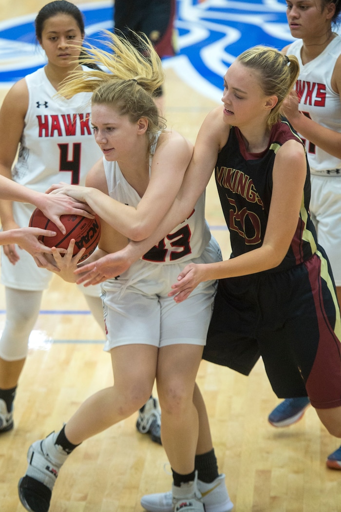 (Chris Detrick | The Salt Lake Tribune) Alta's Marlee Albrecht (33) and Viewmont's Allison Majors (20) go for a rebound during the game at Pleasant Grove High School Thursday, November 30, 2017. Viewmont defeated Alta 65-44.
