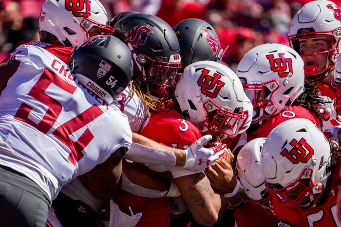 (Trent Nelson  |  The Salt Lake Tribune) Utah Utes quarterback Ja'Quinden Jackson (3) is stopped as the University of Utah hosts Washington State, NCAA football in Salt Lake City on Saturday, Sept. 25, 2021.