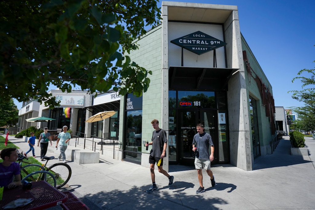 (Bethany Baker  |  The Salt Lake Tribune) People walk out of Central 9th Market  on Thursday, July 10, 2025. The business prepares to throw its first farmers market in Salt Lake City, on July 17.