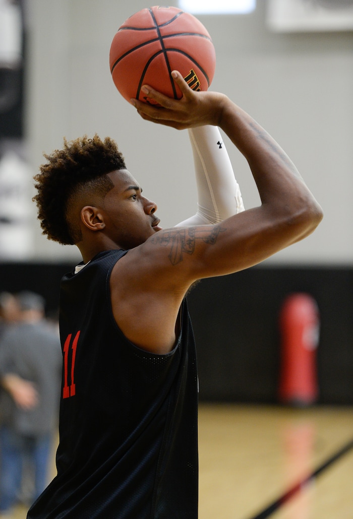 (Francisco Kjolseth  |  The Salt Lake Tribune)  Chris Seeley drops three pointers as the Utah men's basketball program begins fall practices with a fairly new roster of players on Friday, Sept. 29, 2017.