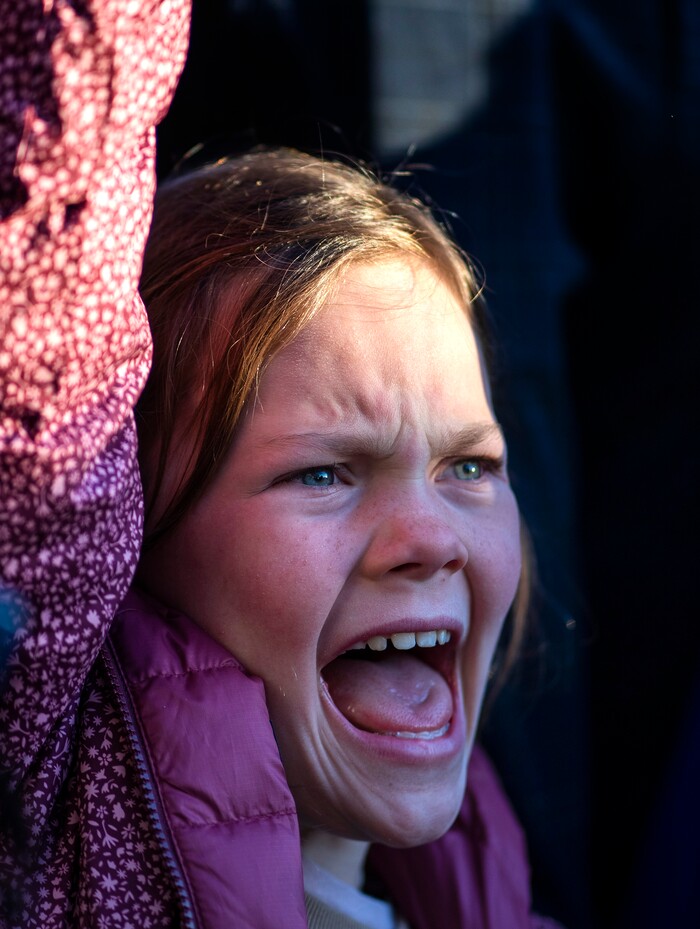 (Rick Egan | The Salt Lake Tribune) A young girl chants along with the crowd, during a rally in support of Ukraine at the Capitol, on Monday, Feb. 28, 2022.