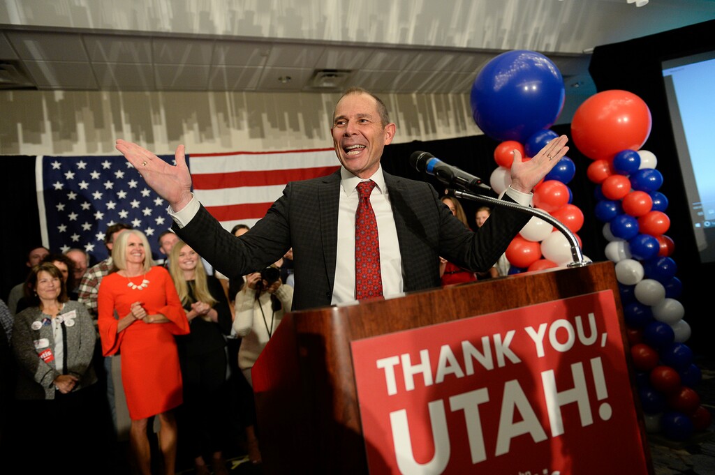 John Curtis, Republican candidate for 3rd Congressional District celebrates his win at the Marriott Hotel & Conference Center Tuesday, Nov. 7, 2017, in Provo, Utah. The Republican mayor of the Mormon stronghold of Provo, has won a special election to replace former U.S. Rep. Jason Chaffetz. (Francisco Kjolseth/The Salt Lake Tribune via AP)