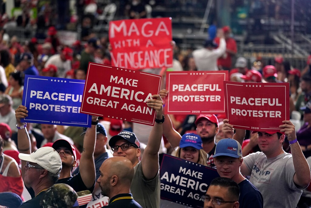(Andrew Harnik | AP file photo)  Supporters wait for President Donald Trump to speak at a rally at Xtreme Manufacturing, Sunday, Sept. 13, 2020, in Henderson, Nev.