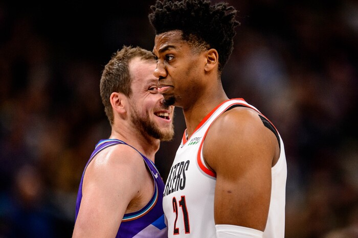 (Trent Nelson  |  The Salt Lake Tribune) Utah Jazz forward Joe Ingles (2) smiles toward Portland Trail Blazers center Hassan Whiteside (21) after being called for a technical foul as the Utah Jazz host the Portland Trail Blazers, NBA basketball in Salt Lake City on Thursday, Dec. 26, 2019.