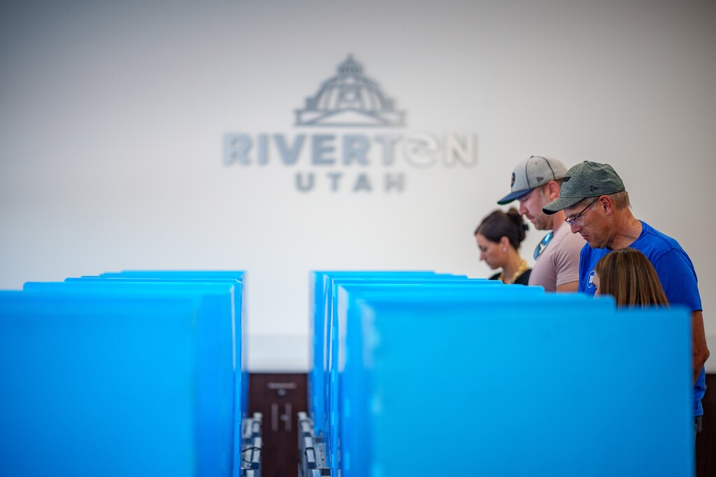 (Trent Nelson | The Salt Lake Tribune) Citizens vote at Riverton City Hall in 2024. Utah election officials say Riverton mayoral candidate broke the law by omitting a key disclosure on a campaign mailer.