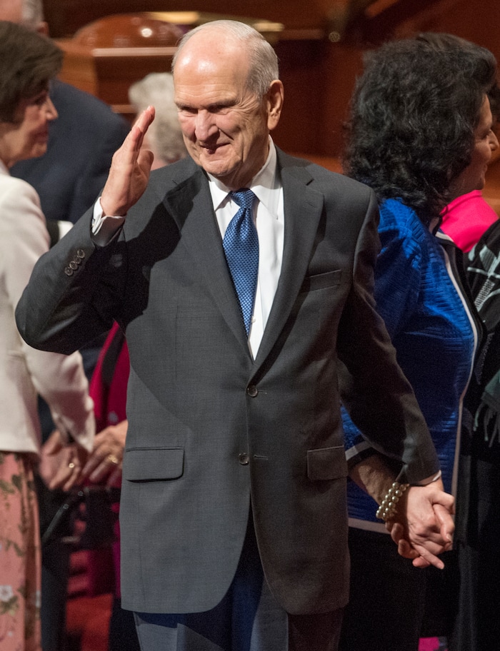 (Rick Egan  |  The Salt Lake Tribune)         President Russel M. Nelson waves to the crowd as leaves the stand with his wife sister Wendy Nelson, at the conclusion of the Saturday morning session of the 188th Annual General Conference in Salt Lake City,  Saturday, March 31, 2018.