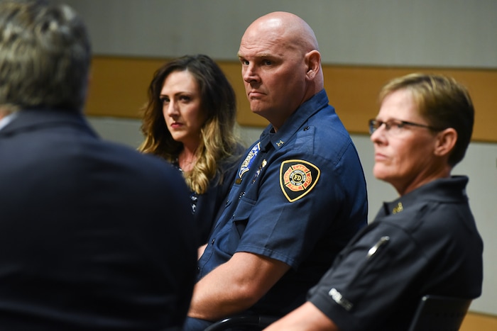 (Francisco Kjolseth | The Salt Lake Tribune) Tribune Editor Jennifer Napier-Pearce moderates a conversation with police officers and firefighters about mental health at the Salt Lake Public Library on Thursday, May 24, 2018. Pictured are Shante Johnson, spokeswoman for the Utah State Lodge Fop (Fraternal Order of Police) and the widow of Sgt. Derek Johnson, who was killed in the line of duty, center, Salt Lake City Fire Capt. Mike Stevens and Sgt. Lisa Pascadlo.