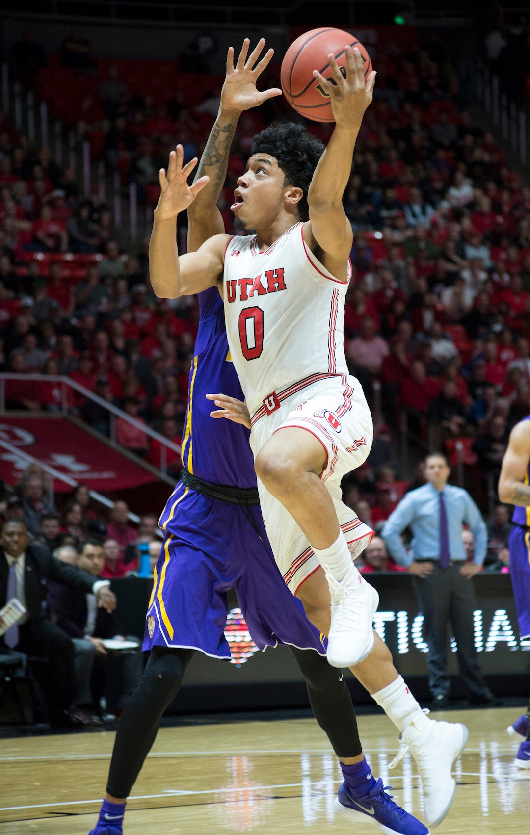 (Rick Egan  |  The Salt Lake Tribune)    Utah Utes guard Sedrick Barefield (0) takes the ball to the hoop, in NIT playoff action between Utah Utes and LSU Tigers at the Jon M. Huntsman Center, Monday, March 19, 2018.