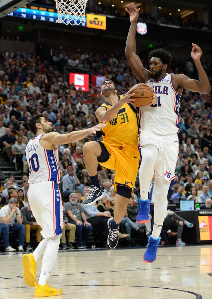 (Francisco Kjolseth  |  The Salt Lake Tribune)  Philadelphia 76ers guard Furkan Korkmaz (30) and Philadelphia 76ers center Joel Embiid (21) pressure Utah Jazz forward Georges Niang (31) as the Utah Jazz host the Philadelphia 76ers in their NBA basketball game at Vivint Smart Home Arena in Salt Lake City on Wed. Nov. 6, 2019.
