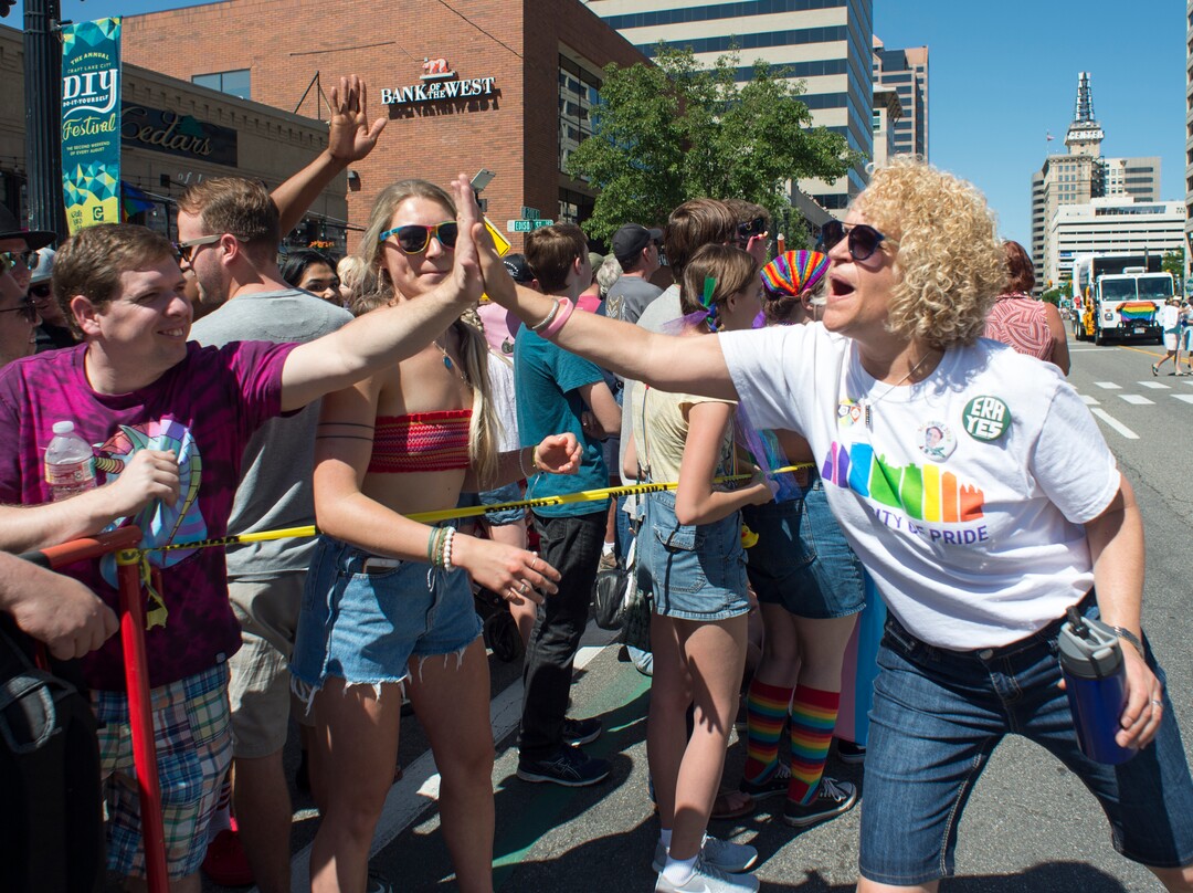 (Rick Egan  |  The Salt Lake Tribune)   Salt Lake City Mayor, Jackie Biskupski high-fives parade goers as she walks in the Utah Pride Parade, Sunday, June 3, 2018.