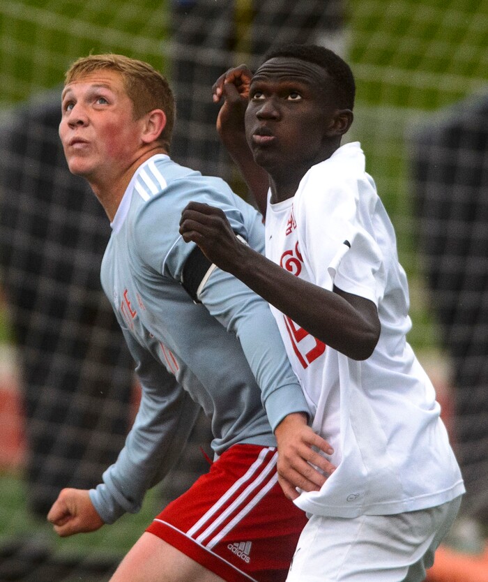 (Steve Griffin  |  The Salt Lake Tribune) Judge's Emmanuel Okongo, right, battles Delta's Sam Clark during the Class 3A boys' soccer state semifinal at Alta High School in Sandy Friday May 11, 2018.