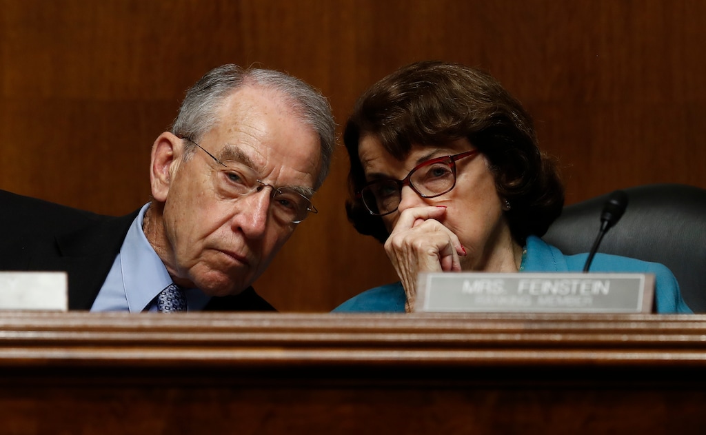 FILE - In this May 3, 2017 file photo, Senate Judiciary Committee Chairman Sen. Charles Grassley, R-Iowa talks with the committee's ranking member Sen. Dianne Feinstein, D-Calif. on Capitol Hill in Washington.  (AP Photo/Carolyn Kaster, File)