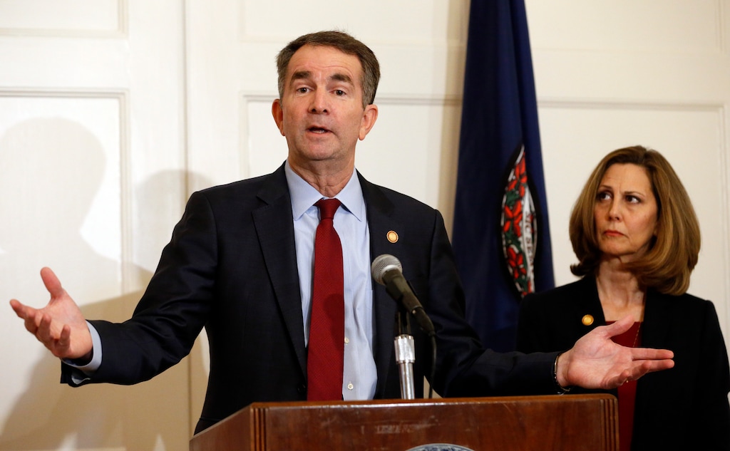 In this Feb. 2, 2019, photo, Virginia Gov. Ralph Northam, left, accompanied by his wife, Pam, speaks during a news conference in the governor's mansion in Richmond, Va. Democrats are hoping there’s a silver lining to the Northam mess - that it shows they won’t tolerate racism. Every level of the party has condemned the Democratic Virginia governor and demanded he step down. That follows disclosure that his medical school yearbook page features photos of a man in blackface standing with someone dressed in Klu Klux Klan attire.(AP Photo/Steve Helber)