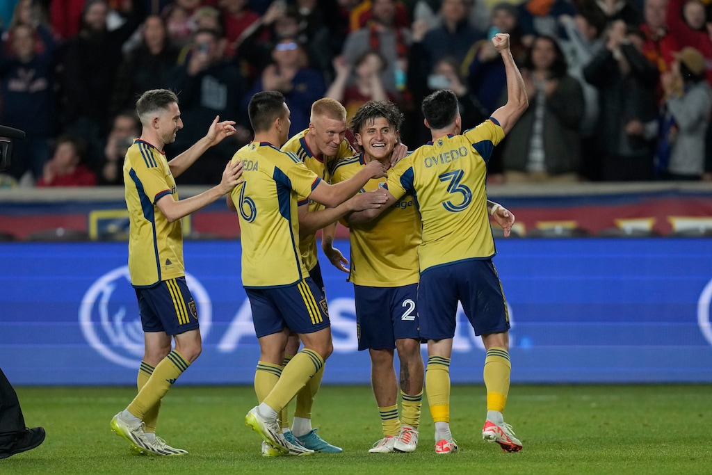 Real Salt Lake midfielder Diego Luna, second from right, celebrates with teammates after scoring against the Houston Dynamo following an overtime penalty shot during an MLS playoff soccer match Monday, Nov. 6, 2023, in Sandy, Utah. (AP Photo/Rick Bowmer)