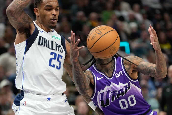(Francisco Kjolseth  |  The Salt Lake Tribune) Dallas Mavericks forward P.J. Washington (25) pressures Utah Jazz guard Jordan Clarkson (00) during an NBA basketball game Monday, March 25, 2024, in Salt Lake City.