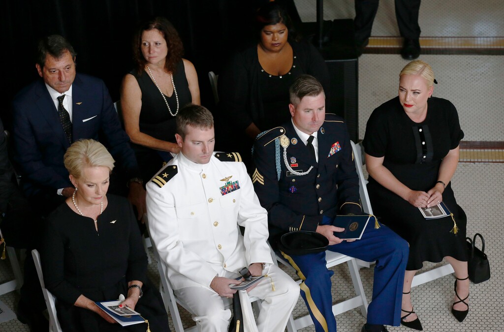(Ross D. Franklin | The Associated Press) Cindy McCain, wife of Sen. John McCain, R-Ariz. sits with her sons Jack, Jimmy, and daughter Meghan, right, during a memorial service at the Arizona Capitol on Wednesday, Aug. 29, 2018, in Phoenix.