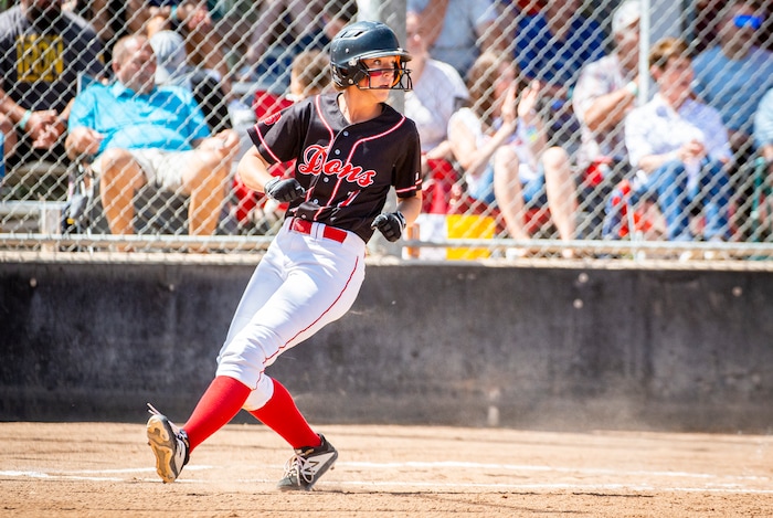 (Isaac Hale | Special to The Tribune) Spanish Fork Kiley Mitchell (7) crosses home plate for a run during the second game of a best-of-three series between the Spanish Fork Lady Dons and the Mountain Ridge Sentinels as part of the 5A state softball championship held at the Spanish Fork Sports Park on Friday, May 28, 2021.
