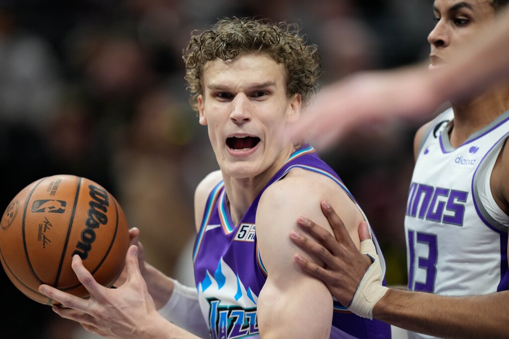 (Francisco Kjolseth | The Salt Lake Tribune) Utah Jazz forward Lauri Markkanen (23) tries to push his way past Sacramento Kings forward Keegan Murray (13) as the Utah Jazz take on the Sacramento Kings in NBA basketball at Vivint Arena in Salt Lake City on Tuesday, Jan. 3, 2023.