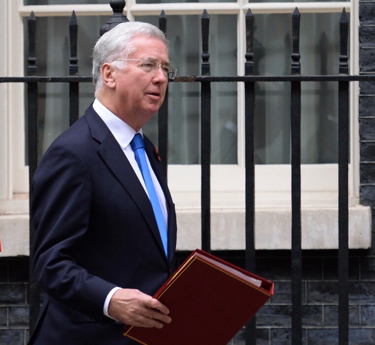 Britain's Defence Secretary Sir Michael Fallon leaving Downing Street in London, following a Cabinet meeting, Tuesday Oct. 31, 2017. UK government says Defense Secretary Michael Fallon has resigned Wednesday Nov. 1, 2017, after allegations of inappropriate behavior. (Stefan Rousseau/PA via AP)