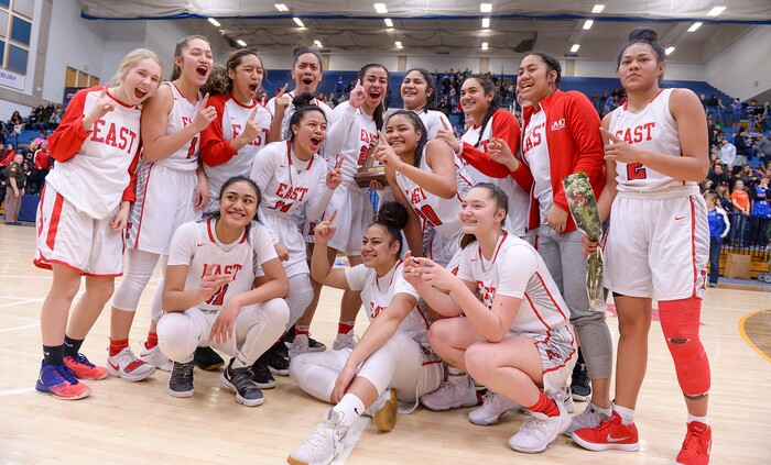 (Leah Hogsten  |  The Salt Lake Tribune) East celebrates the win.  East defeated Timpview 68-48 to win the the 5A High School Girls' Basketball Tournament title at SLCC in Taylorsville, Saturday, Feb. 24, 2018. 