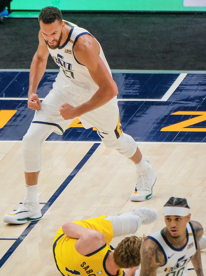 Leah Hogsten | The Salt Lake Tribune Utah Jazz center Rudy Gobert (27) flexes after denying Indiana Pacers forward Domantas Sabonis (11) at the net as the Utah Jazz host the Indiana Pacers, April 16, 2021 at the Vivint Arena.