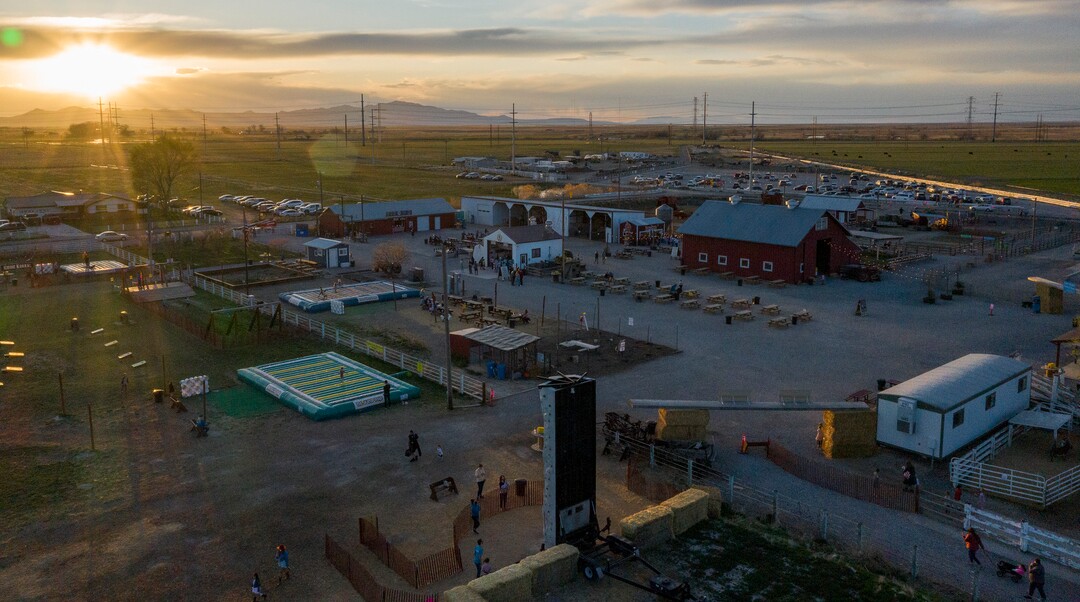 (Leah Hogsten | The Salt Lake Tribune) The sun sets on the farm during the Baby Animal Festival  and Tulip Field Festival at Cross E Ranch, April 23, 2021. The festival runs unlil May 8.